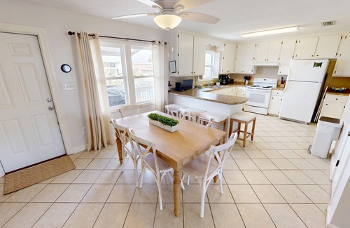 Holiday Isle House | Dog Friendly 5 BR Home across the street from Beach with Boat Dock
