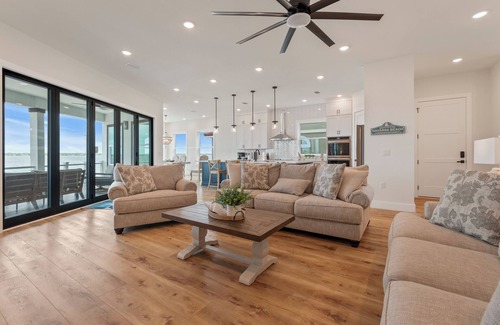 Caribbean Isle House | Dolphin Cove-Luxury Soundfront retreat w/private pier. 6 bed/6.5 bath sleeps 16