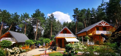 Rakow Ski Chalet | Domki całoroczne z baliami i sauną Leśny Czar