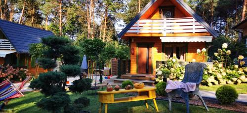 Rakow Ski Chalet | Domki całoroczne z baliami i sauną Leśny Czar