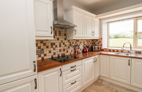 Glencar Cottage | DROMSTABLA, pet friendly in Glencar, County Kerry