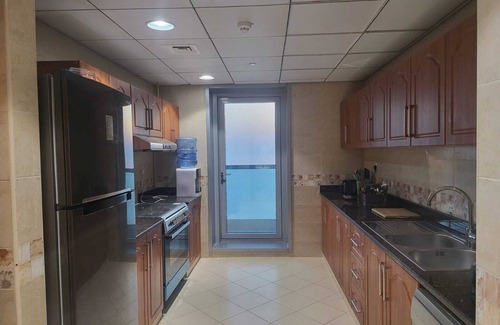 Rumailah Apartment | Duplex Spacious 4-bedroom sunset sea views apartment with swimming pool.