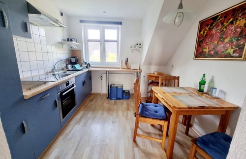 Hattstedt Apartment | End the day with a glass of wine and enjoy the sunset.