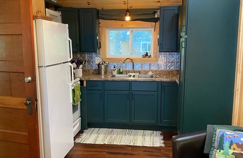 Squaw Lake Cabin | Escape to cozy, secluded lakefront cabin in the north woods