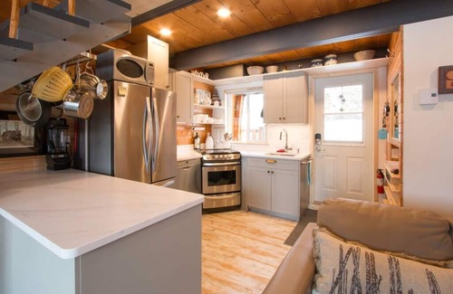 Idabel Lake Cabin | Everly's Hideout near Kelowna & Big White, Sleeps 4, Fire Table, Lakefront Deck