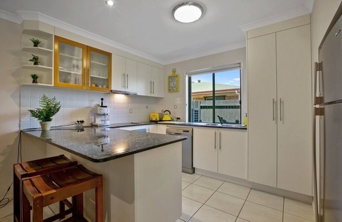 Tin Can Bay House | Exceptional modern three bedroom townhouse with water on both sides.
