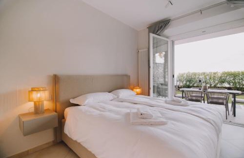 Musso Apartment | Exclusive Garden Apartment with Lake View & Pool