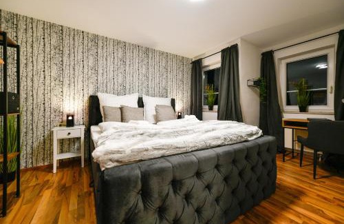 Cottbus Apartment | Exklusives-City-Apartment mit gratis Tiefgarage, Balkon, Waschtrockner, Netflix