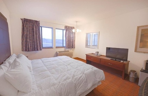 Harlan Hotel | Explore Prairie Rose, Pet Friendly Unit Stay w/Parking Included