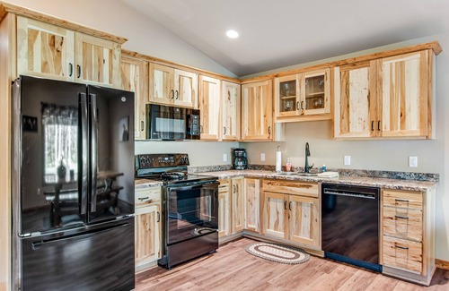 Conover House | Exquisite dog-friendly cabins with hot tub, fireplace, patio, grill, central AC, & W/D