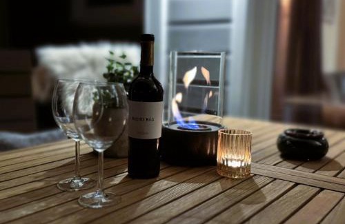 Grundhof House | Fördezauber - Ruhiges Ferienhaus mit eingezäuntem Garten und Kamin