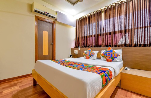 Prahlad Nagar Hotel | Fabexpress Relax Inn