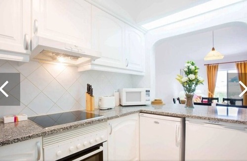 Alpouvar Apartment | Family ground floor sth faceing garden apartment with unobstructed views n