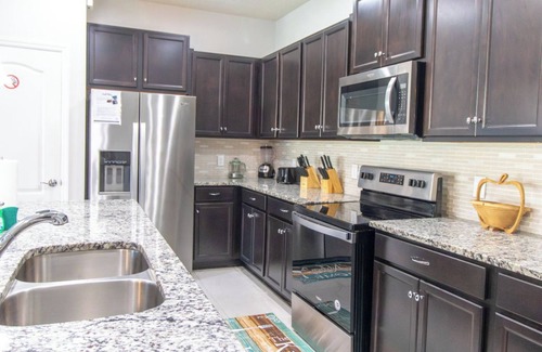 Windsor Hills House | Family Oasis! Luxe 5BD/4.5BA Townhouse w/Private pool, Disney Proximity