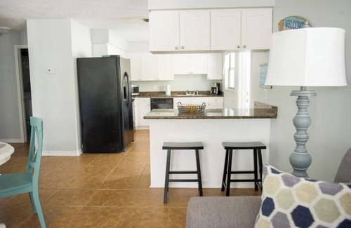 Indian Rocks Beach Condo | Family reunion? Girls' Trip? Small wedding? This pool property is the perfect spot- right across the street from the beach with a pool!