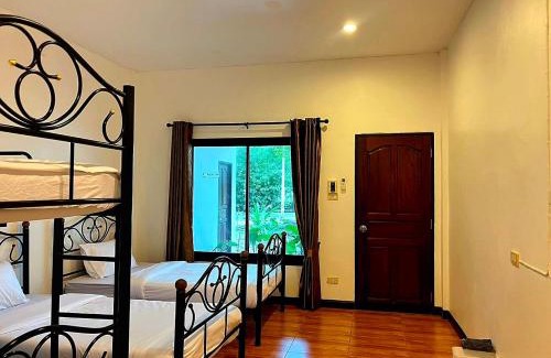 Samut Sakhon House | Family room by The Grounds