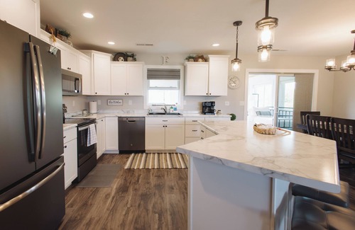 Littleport House | Family-sized house near Guttenberg. Sleeps 13. Hot tub, game room, fire pit