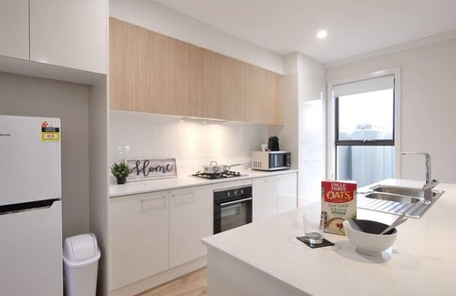 Woodville North House | FEEL HAPPY & AT HOME HERE. No stairs. Modern designer space. Ducted A/C. Double garage.