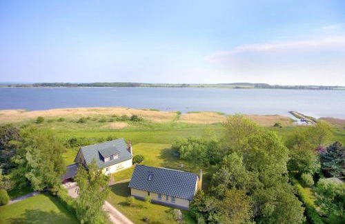 Kammin House | Ferienhaus Kormoran Haus - Terrasse, Garten, am Wasser
