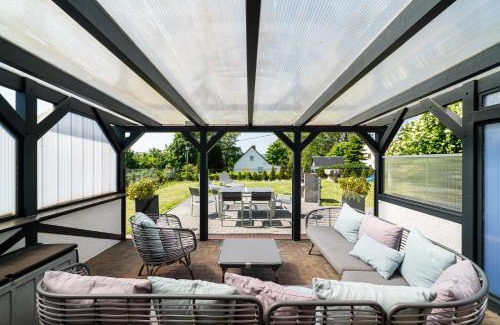 Zirkow Apartment | Ferienhaus Landlust - Erholung mit Fasssauna und Whirlpool nahe Binz!