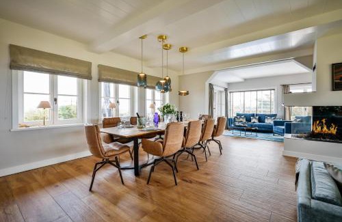 List House | Ferienhaus One Sylt - Traumhaus unter Reet, zwischen Wattenmeer und Nordsee