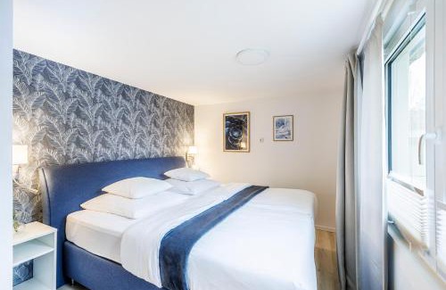 Joachimsthal House | Ferienhaus Waldgeflüster 70 QM I überdachte Terrasse I 2 Schlafzimmer I Strandnah