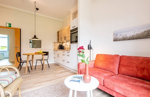Rantum Apartment | Ferienwohnung im Erdgeschoss mit Eigener Holzterrasse