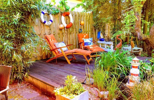 Gruenberg Apartment | Ferienwohnung im Garten Eden