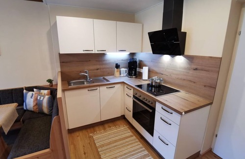 Gnesau Sonnleiten Apartment | Ferienwohnung Kaiserburg - Pension & Ferienwohnung Sonnleiten