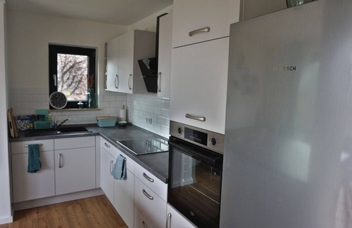 Bad Freienwalde Apartment | Fewo EG am Fluss mit Terrasse - Eine Grüne Oase