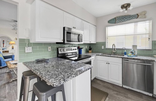 Anna Maria House | Flirty Flamingo Cottage Updated beach cottage, moments from the sand, w/pool!