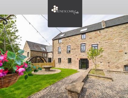 Douglas and Angus Apartment | FLOUR MILL HOUSE at PITKERRO MILL, 4 double bedrooms, TVs, 3 en-suite, separate shower, wc, fully equipped kitchen, games room, large family lounge, private parking, WiFi, private garden and courtyard, long stay rates available through Honeycomb Hosts