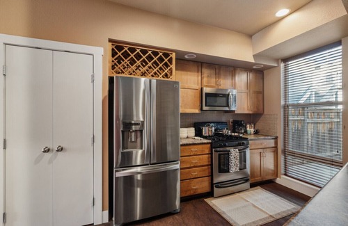 Old Town North Apartment | FoCo Patio Oasis – King Beds & Walkable Location