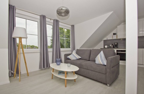 Gross Zicker Apartment | Free use of the AHOI adventure pool and sauna - Haus Inselwind FeWo MEERwind