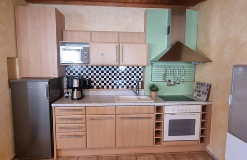 Sommerach Apartment | Freistehendes und gemauertes Gartenhäuschen für 1-2 Personen