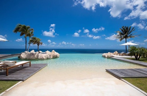 Les Terres Basses Villa | French Caribbean Style villa with 4 of the 5 bedrooms face the ocean.