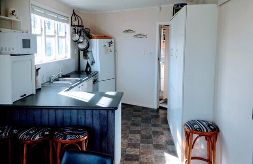 Turangi House | Full of character, modern and cosy Rose Lodge