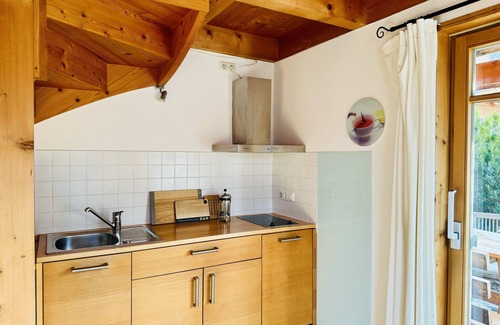 Oberammergau Apartment | Gemütliche, Modern Ausgestattete Ferienwohnung mit Sonnenterasse und Bergblick