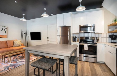 Holland Condo | George 202: Modern 8th Street Condo with City-View Balcony