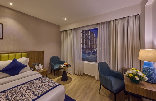 Vyalikaval HBCS Layout Hotel | Grand Continent Hebbal a Sarovar Portico Affiliate Hotel