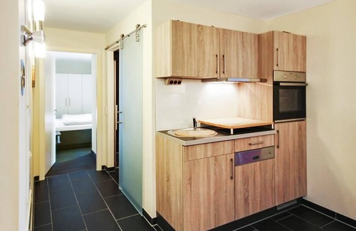 Wremen Apartment | Great, quiet vacation apartment near the beach with sauna and balcony with dyke view