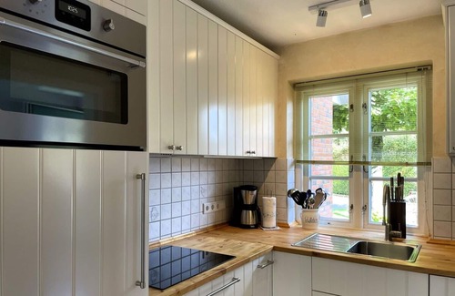 Wyk auf Foehr Apartment | Green Eilun 13 - Modernes Reihenhaus mit Garten, Spielecke, Waldzugang und Nähe zum Südstrand