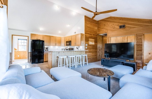 Palisade Acres House | Handsome raised home with private hot tub, & central AC