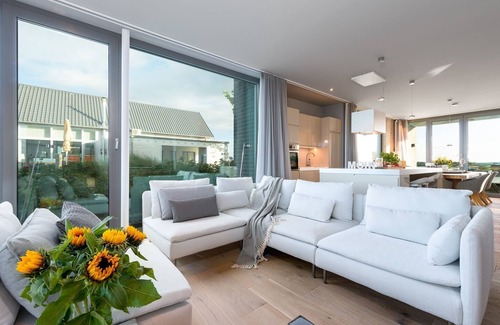 Olpenitz Apartment | "Heimathafen 2" vacation apartment with sauna, south-facing terrace & roof terrace by the water