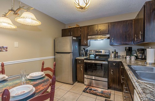 Helen Condo | Helen Riverfront 1BR 2BA Condo | Balcony Overlooking River | Downtown Helen