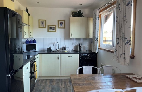 Dumfries Cabin | Heron Lodge, edge of Mabie Forest with breathtaking surrounding views Sleeps 4 .