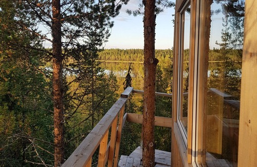 Arvidsjaur House | High in the trees in northern Sweden with lake views and moose under the terrace