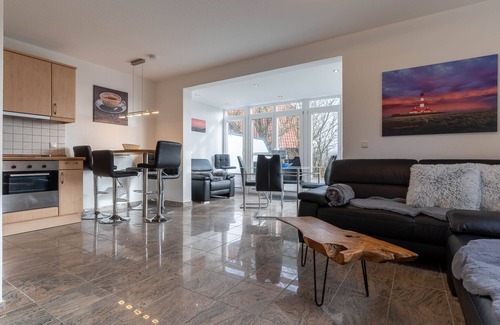 St. Peter-Ording Apartment | High-quality 3-room ground floor apartment directly on the dike with terrace for 4 pers.