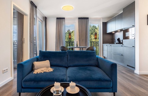 Altenbeken Apartment | Holiday Apartment "Egge Resort 7d" with Balcony, Whirlpool and Sauna with Viaduct View