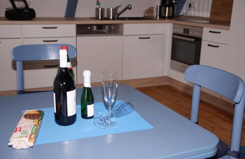 Pommerby Apartment | Holiday by the sea in a thatched house with fireplace and sauna